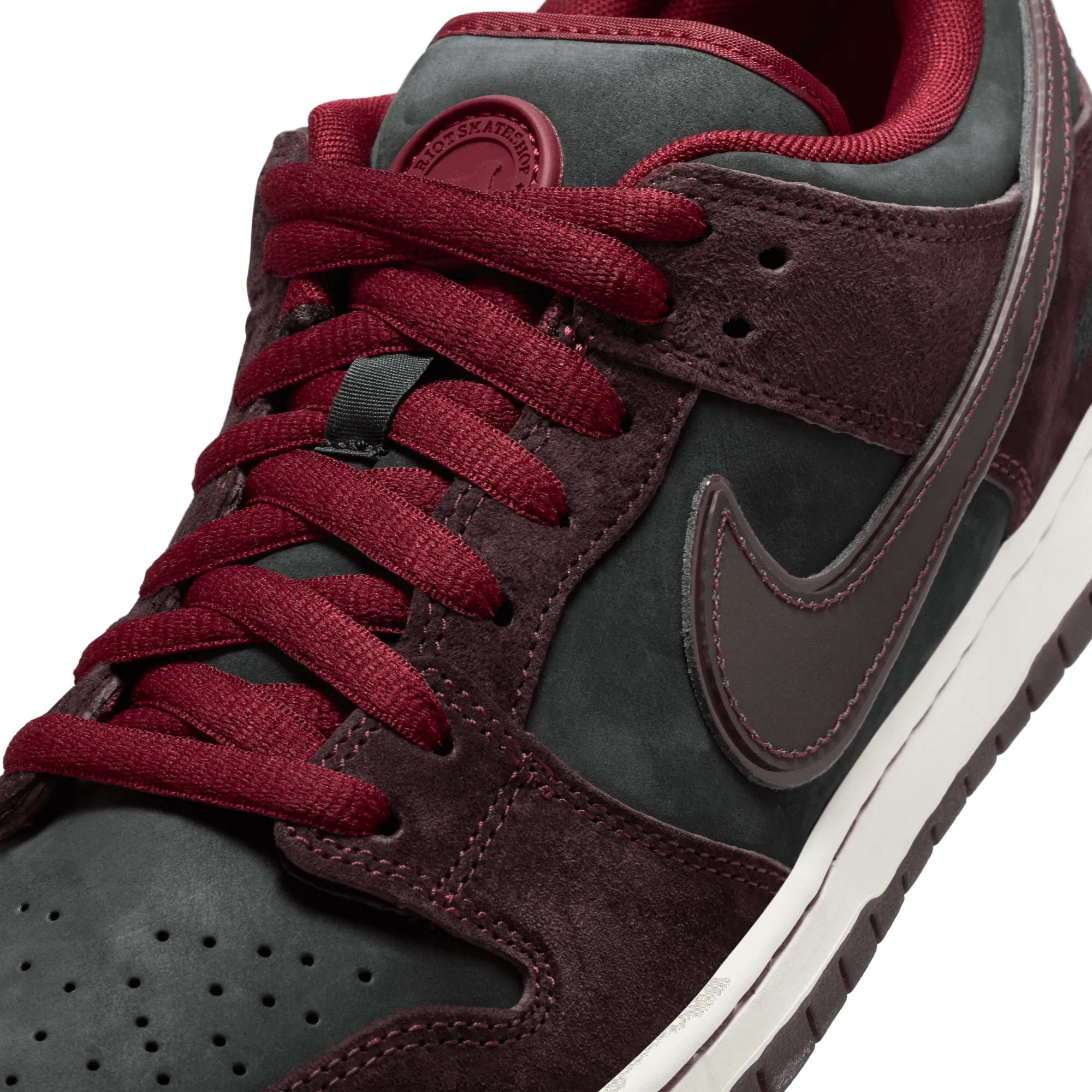 Nike SB x Riot Skate Shop Dunk Low Pro QS Skateboard Shoe - Mahogany/Dark Beetroot-Team Red-Sail